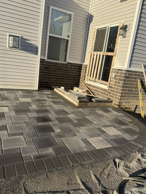 Paver patio off back entry