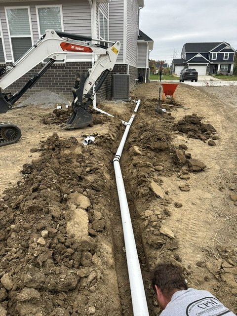 Mini excavator drain line install